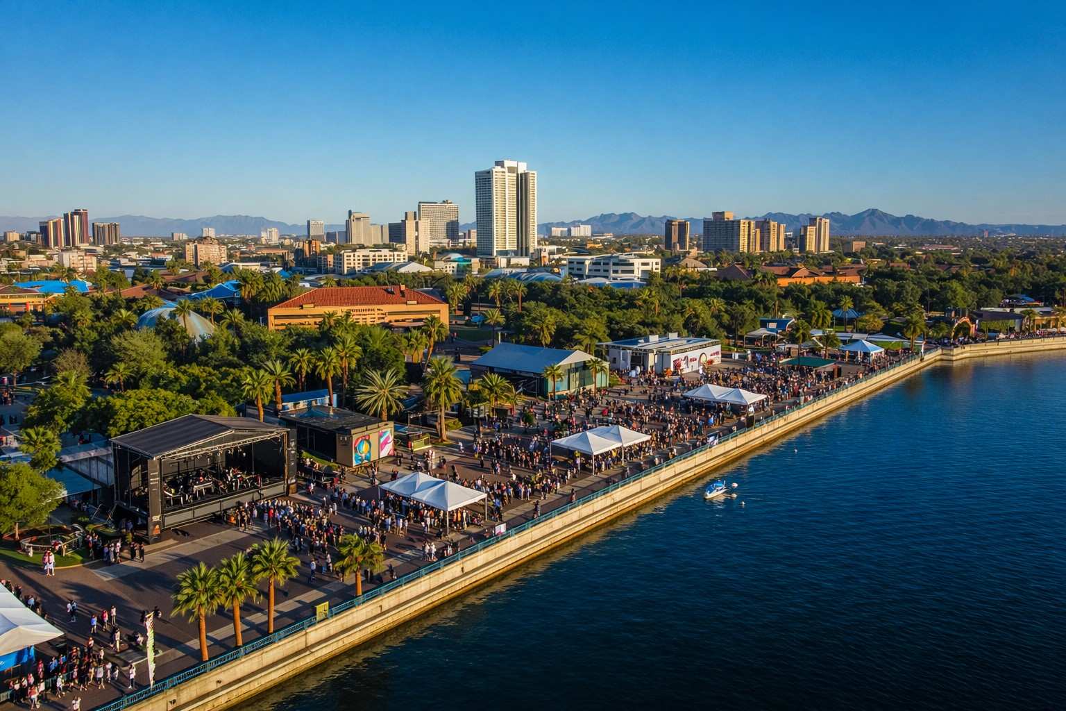 Aerial view of Tempe Beach Park packed with crowds and stages during Innings Festival Tempe Arizona